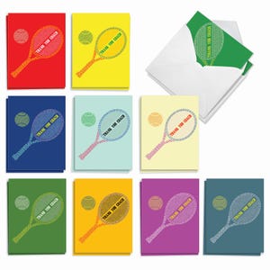 May include: A set of colorful greeting cards featuring a tennis racket and ball graphic. Each card displays the text THANK YOU COACH formed by the racket strings. The collection includes red, yellow, blue, light blue, cream, green, orange, purple, and teal cards with matching white envelopes.