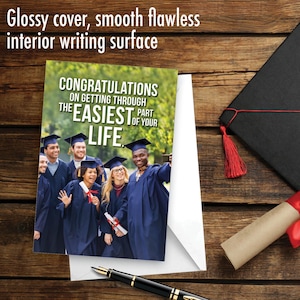 May include: A graduation card with a photo of a group of graduates in caps and gowns. The card reads "Congratulations on getting through the easiest part of your life."