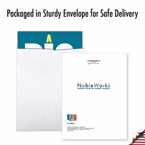 Puede incluir: Un sobre blanco con una tarjeta azul y amarilla en su interior. La tarjeta tiene el texto "A Big One". El sobre tiene el texto "Noble Works" y "modern cards for modern people".