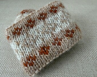 Diadema/orejera de lana islandesa tejida a mano: un accesorio de invierno cálido, acogedor y elegante.