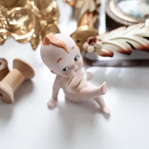 Vintage Bisque Kewpie -Kewpie Sitting