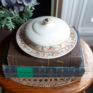 Vintage Stained Rustic Round Butter Dish with Cover and butter plate with a floral design-