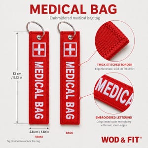 May include: Two rectangular red fabric medical bag tags with white embroidered text reading MEDICAL BAG and a white cross symbol. Each tag measures 5.12 inches by 1.10 inches and features a silver metal keyring, thick stitched borders, and raised satin embroidery.