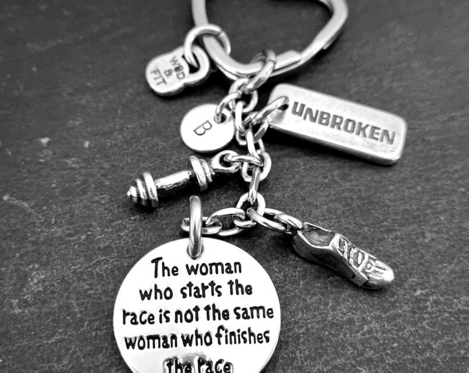 A motivational and empowering keychain designed for strong, determined women.