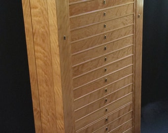 Large jewelry storage tower with twenty drawers and two doors, includes locks, custom dividers, hanging storage in the armoire, cabinet, box