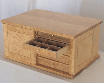 Birdseye maple jewelry storage cabinet with key lock and ten drawers. Unique gift for collectors who need individualized drawer dividers.