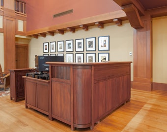 Custom office furniture reception desk from mahogany with computer desk, office storage, and organizer function. Also, mail organizer too.