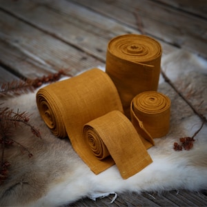 Viking Leg and Arm wool or leg Winingas Vindingr Wickelbander. These warps are the perfect garb for Norse, SCA and LARP Reenactment