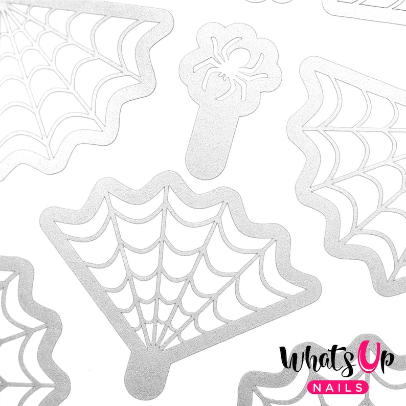 May include: A set of five silver nail stencils featuring spiderwebs and a spider. The stencils are designed for nail art and are perfect for creating spooky Halloween designs.