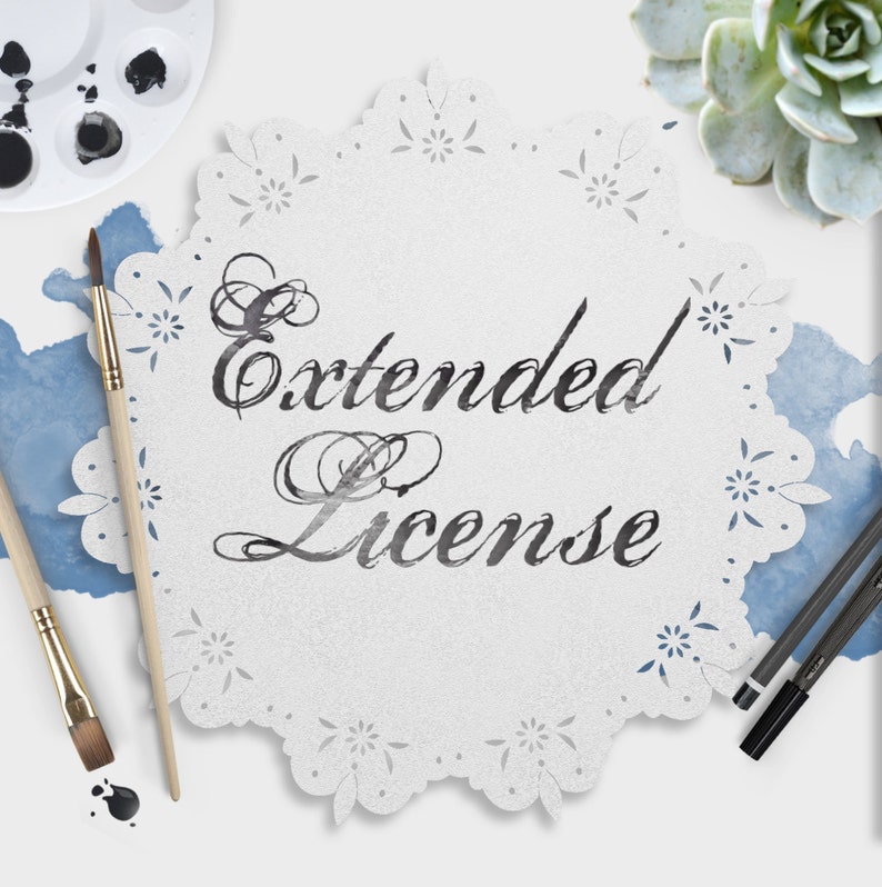 May include: A white doily with a black script font that reads "Extended License". The doily is surrounded by paintbrushes, a paint palette, and a succulent plant.