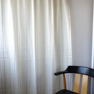 May include: A set of three ceramic mugs with a speckled, matte finish. The mugs are in shades of cream, light grey, and dark grey. Each mug has a simple, minimalist design, ideal for coffee or tea.