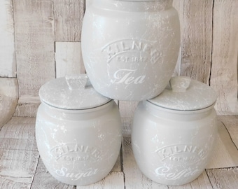 white tea and coffee jars