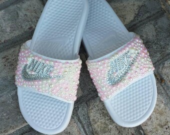 blue and pink nike slides