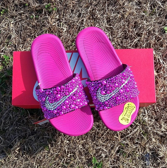 neon pink nike slides
