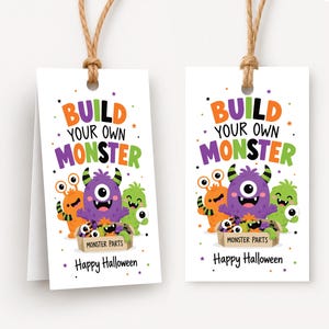 May include: Two rectangular white gift tags with jute twine loops featuring the text BUILD YOUR OWN MONSTER in colorful letters. The design includes three cartoon monsters and a box labeled MONSTER PARTS with the text Happy Halloween below.