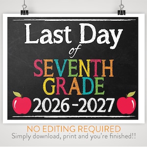 May include: A rectangular sign with a black chalkboard background featuring the white text Last Day of, the colorful text SEVENTH GRADE, the white text 2026-2027, and two red apples with green leaves on the bottom left and right corners.