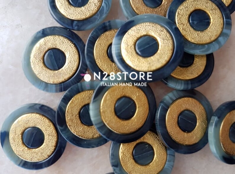 with golden central circles Beautiful gray marbled buttons