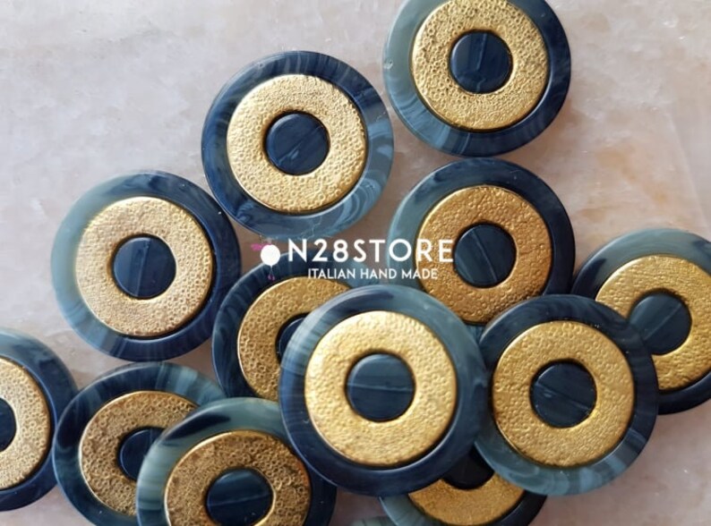 with golden central circles Beautiful gray marbled buttons