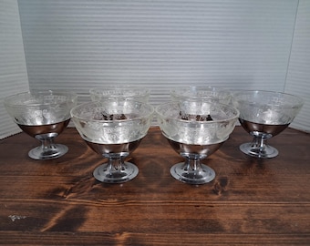 Set a six vantage ice cream /sherbert dishes beautiful , clear depression glass was stainless steel base