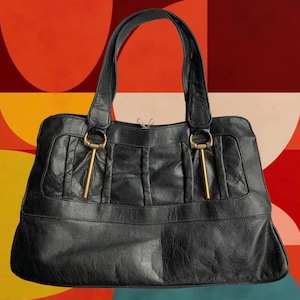 Vintage 70&#39;s Black Leather Handbag • w/Gold Metal Hardware • Three Separate Interior Sections • 3D Detailing in Front • In Great Condition!
