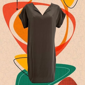May include: A dark gray short-sleeved dress with a v-neck collar.