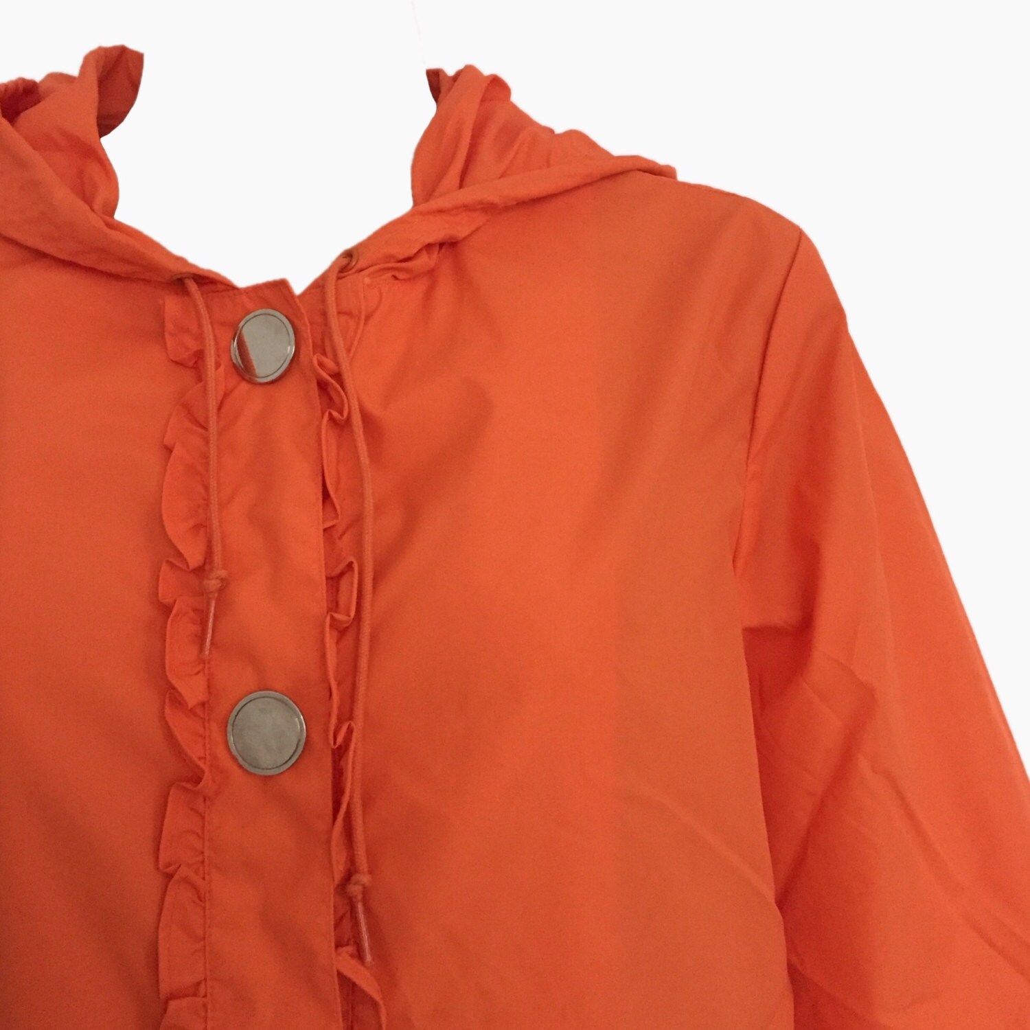 Super Cute Bright Orange Rain Jacket With Small Ruffle Detailing Mirror