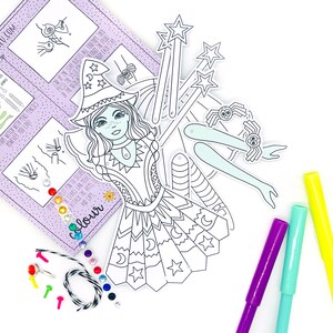 May include: A black and white paper craft kit featuring a witch with a star-shaped wand, a spider, and a crescent moon. The kit includes colorful gems, string, and push pins.