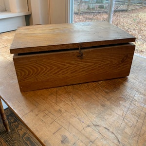 Handmade vintage wooden keepsake box. Measures 13 x 8.5 x 4.5 inches. Hinged antique wooden box. Antique handmade farmhouse style box