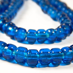 50 Pcs - 9x6mm Transparent Dark Aqua Blue Glass India Crow Beads - Crow Rollers - Glass Pony Beads - Large Hole - Jewelry Supplies