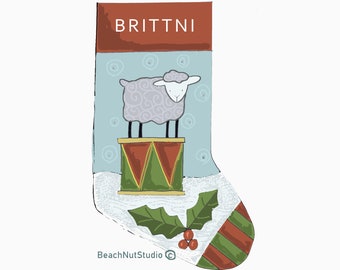 May include: A blue and red Christmas stocking with the name "BRITNI" at the top. A white sheep is standing on a green, red, and yellow drum. The stocking has a green holly sprig with red berries.