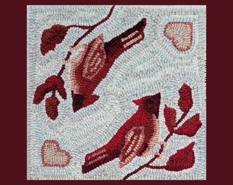 May include: A rug with a white background and two red cardinals perched on branches. The cardinals are surrounded by red leaves and hearts.