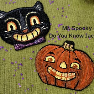 May include: Two Halloween-themed, handmade rugs. One is a black cat with a smiling face and a purple bow tie. The other is an orange pumpkin with a smiling face. The text "Mr. Spooky & Do You Know Jack?" is also visible.