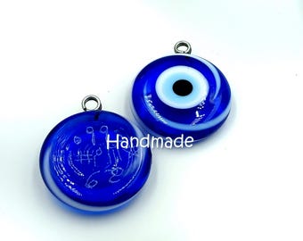 Envy. Evil eye. Gossip. Special handmade talisman on blue glass Nazar