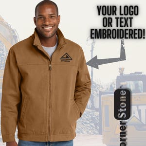 May include: A brown work jacket with a zipper closure and a small logo on the chest. The jacket is worn by a person in blue jeans. Text on the image says "YOUR LOGO OR TEXT EMBROIDERED!" and "Corner Stone".