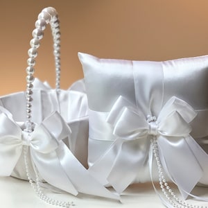 white flower girl basket and ring bearer pillow set