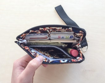 Pochette pour cartes à fermeture éclair portefeuille avec bracelet - Pochette à fermeture éclair qui contient de l'argent liquide, des cartes de crédit, des pièces de monnaie, des téléphones portables et tout le reste