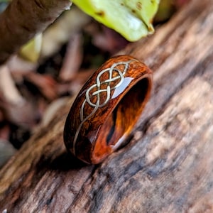 Ironwood and White Gold Celtic Knot Spiral Grain Wood Ring. Handmade, Custom, Wooden Wedding Bands by Grown Rings.