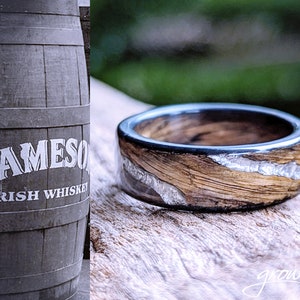 Jameson Whiskey Barrel Platinum Inlay Smoked Spiral Grain Wood Ring. Handmade, Custom, Wooden Wedding Bands by Grown Rings.