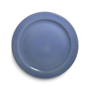 May include: A round, periwinkle blue ceramic dinner plate featuring a smooth, flat center surface and a wide, slightly raised rim. The plate is decorated with two concentric, thin, embossed circular lines that define the border.