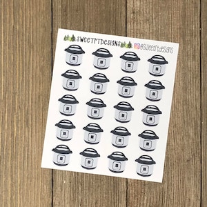 May include: A sheet of white stickers featuring a repeating pattern of small, gray and white pressure cookers. The stickers have a black top and a square control panel. The text "SWEETTPTDESIGNS" and an Instagram handle are visible.