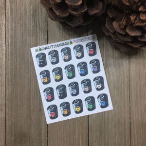 May include: A sheet of 20 coffee pot stickers with a variety of colored coffee mugs. The stickers are white with black outlines and feature a coffee pot with a mug on top. The mugs are in the colors red, orange, yellow, green, blue, purple, and pink.