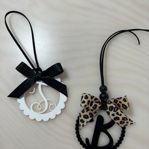 Now offering acrylic charms in black and white. $13.00
