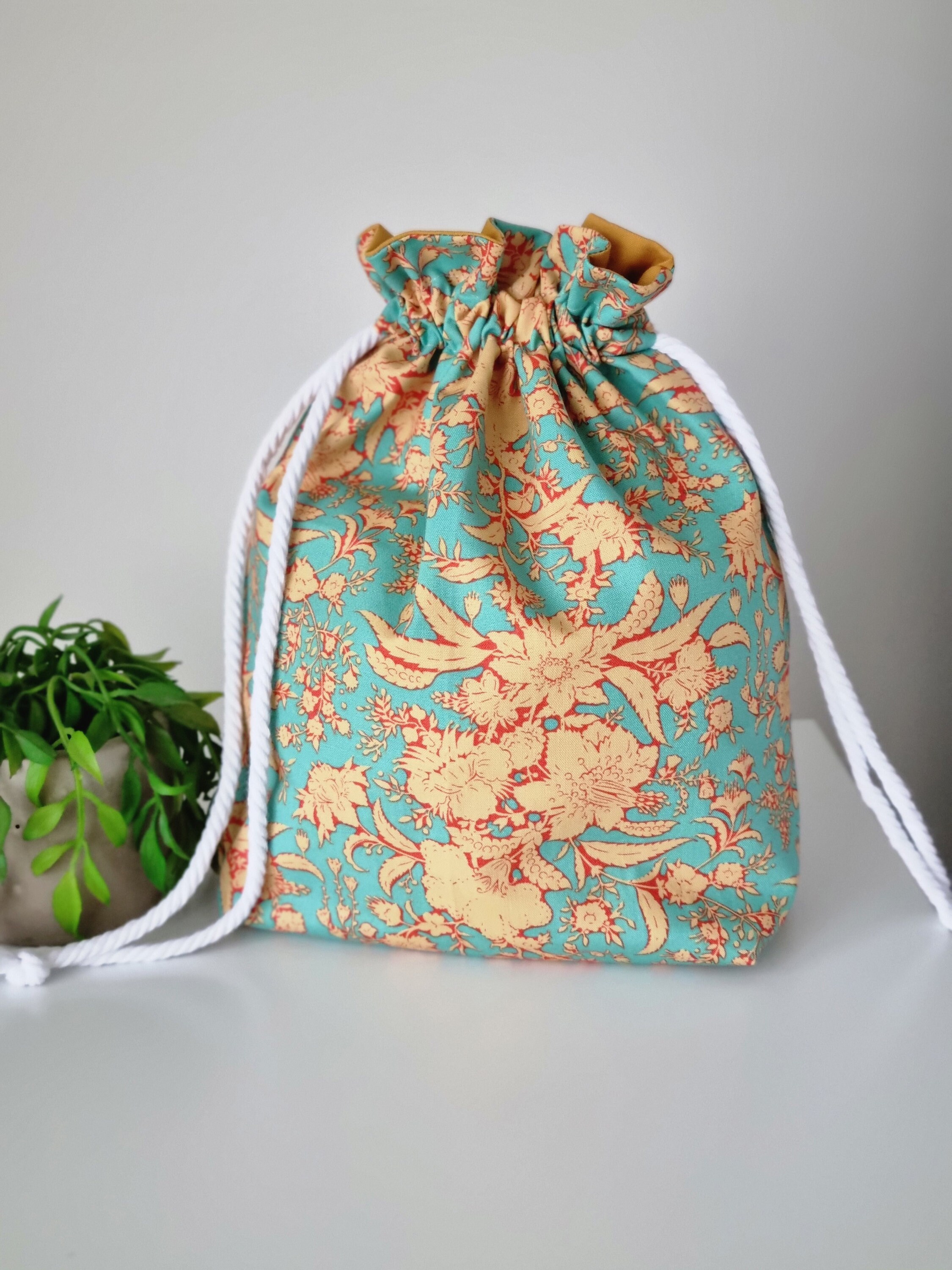 Calico drawstring cheap bags spotlight