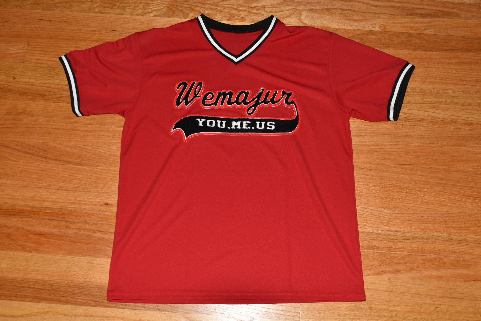 red black and white baseball jersey
