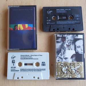 Simple Minds テープ カセット (2 個セット)、ワンス・アポン・ア・タイムとリアル・ライフ