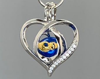 Sterling Silver Pearl Cage Necklace: Crystal Heart Pendant