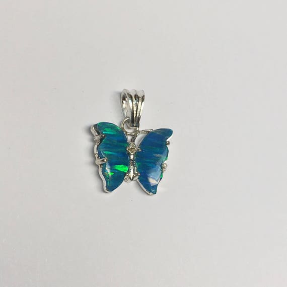 Opal butterfly pendant in sterling silver