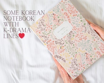 May include: A pink notebook with a floral pattern and the Korean text "내가 사랑하는" which translates to "I love you".