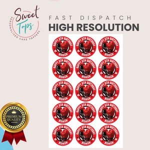 May include: Twelve round red and white birthday cake toppers with a boxing glove design. The toppers say "Happy 8th Birthday Rohan".