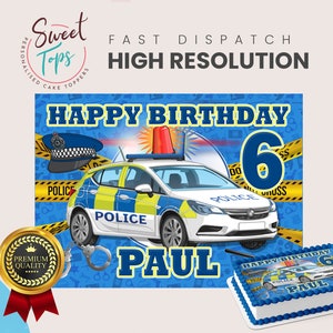 May include: A blue and yellow police car cake topper with the text "Happy Birthday 6 Paul" and a police officer's hat. The topper is on a blue background with yellow police tape.